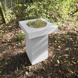 Contemporary Sundial in garden corner Portland